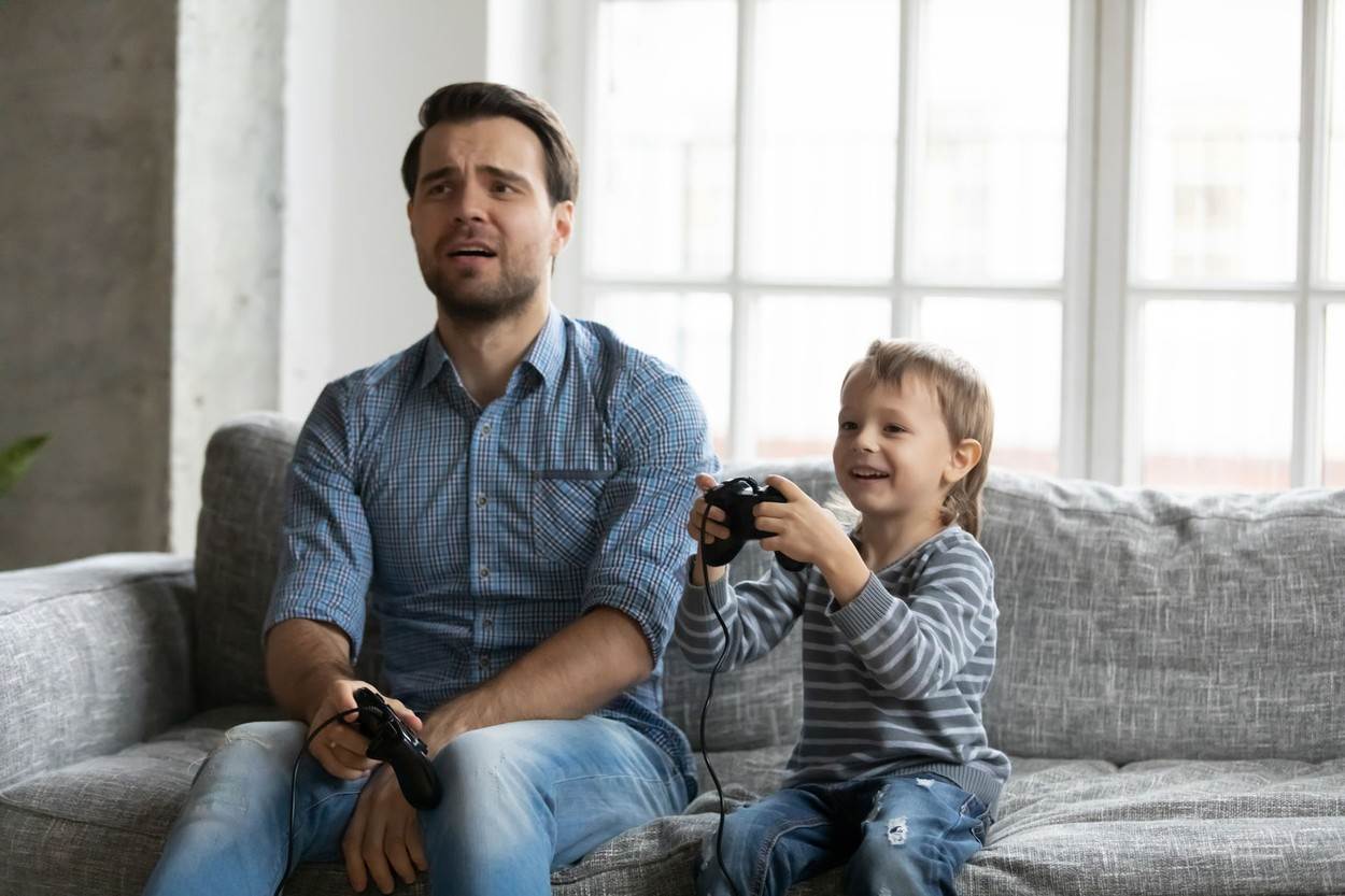  activity;boy;child;computer;console;control;cool;couch;dad;daddy;excited;family;father;friend;fun;funny;game;gamepad;gamer;happy;home;house;joystick;kid;laugh;leisure;living;lose;loser;man;millennial;online;parent;people;play;relationship;room;smiling;sofa;son;together;tv;upset;using;video;videogame;weekend;win;winner;young 