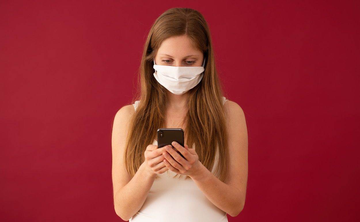  woman;iphone;face mask;message;love;valentine;girl;online dating;female;red;mobile;background;texting;lady;smartphone;feminine;sending;model;phone;mistress;adult;person;human;figure;virus;epidemic;hygiene;protection;safety;flu;medical;mask;pollution;care;allergy;disease;infection;illness;prevention;respiratory;surgical;filter;medicine;breathing;health care;mouth;pandemic;surgical mask;coronavirus;14february 