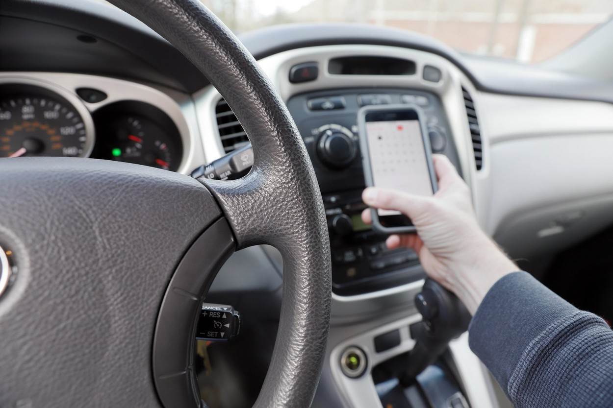  controls;car;automobile;dangerous;driver;distracted;steering;interior;phone;drive;dash;stereo;vehicle;truck;van;automotive;auto;dashboard;transport;wheel;design;modern;inside;black;luxury;expensive;technology;safety;service;equipment;multimedia;transportation;travel;knob;button;audio;background;gear;electronics;abstract;defocus;defocused;electronic;control;alamyunknown;NOT_EDITORIAL_ONLY 